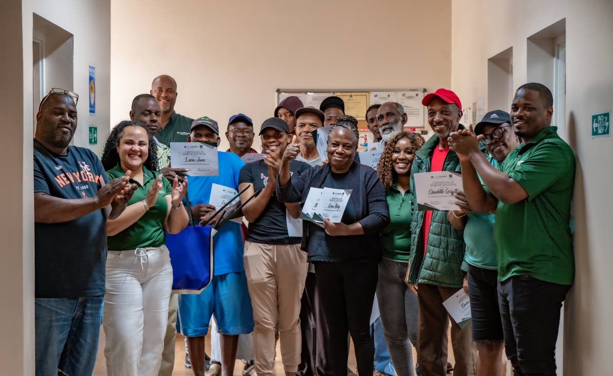  JEP Group employees alongside farmers after completing training in drip irrigation and water harvesting.
