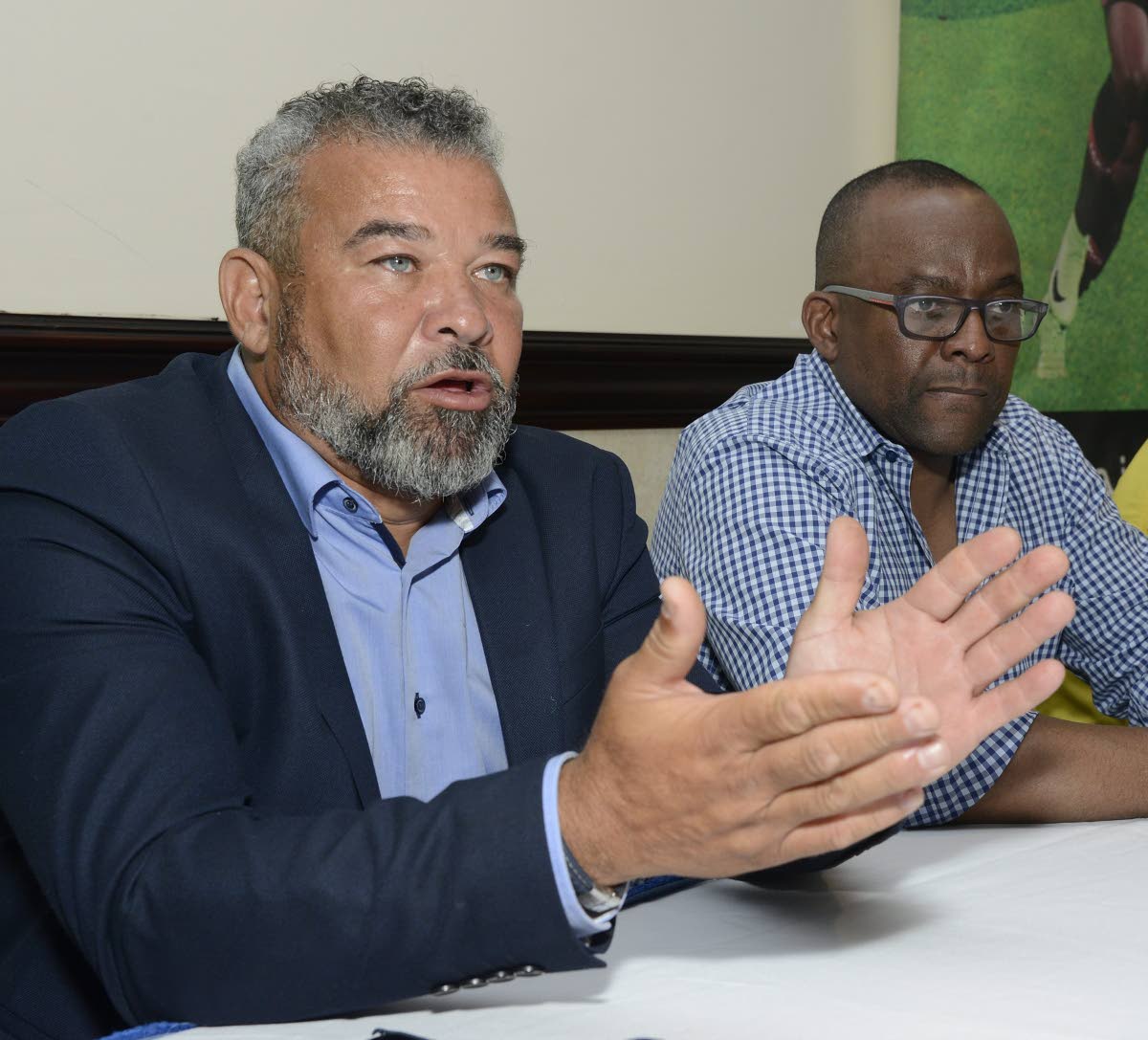 Chapelton Maroons Chairman Craig Butler (left) and PFJL Interim Chairman Donovan White.