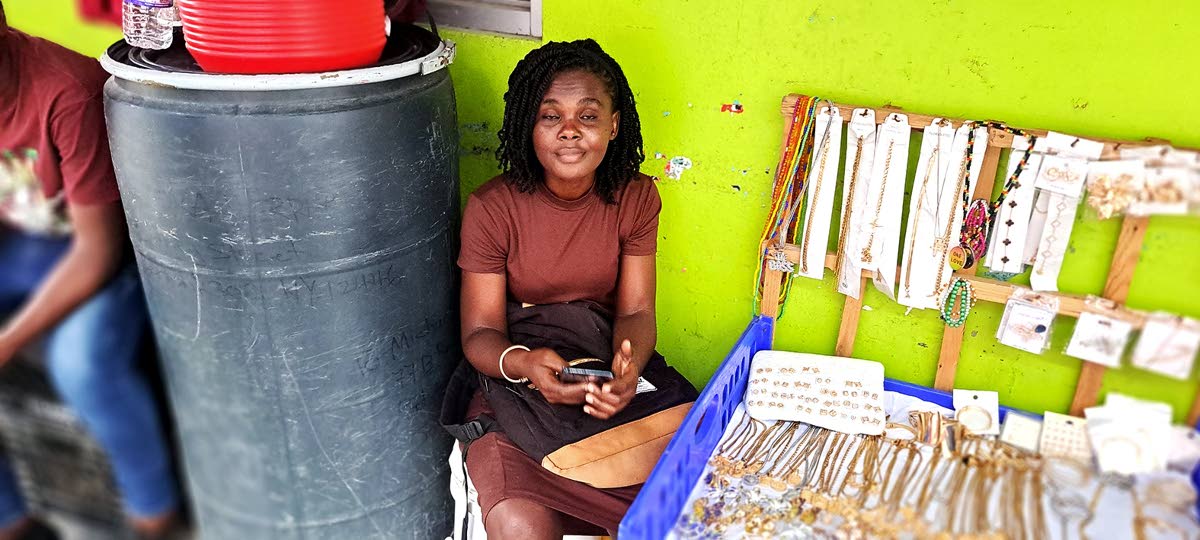 Franceita Renford at her workstation on a corridor along West Street in Port Antonio, Portland.