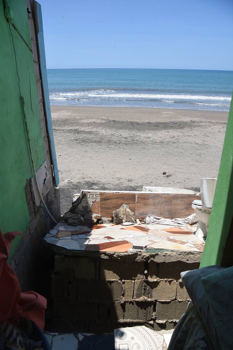 Betty-Ann Brown jokes that she now has the best view from her ravaged home in Alligator Pond, Manchester. She is trying to rebuild further inland but the process is slow as she is in need of help.
