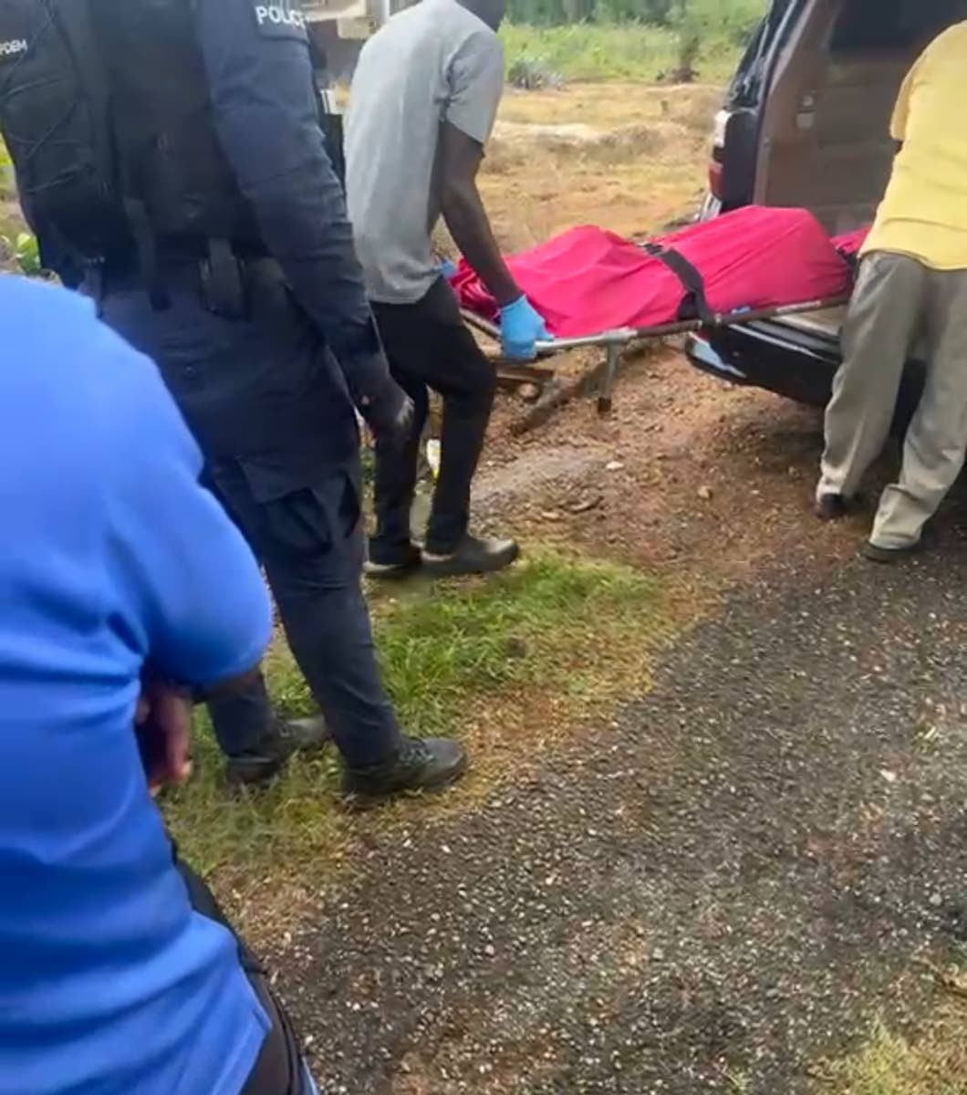 Undertakers remove body of Gary Allwood from his home.