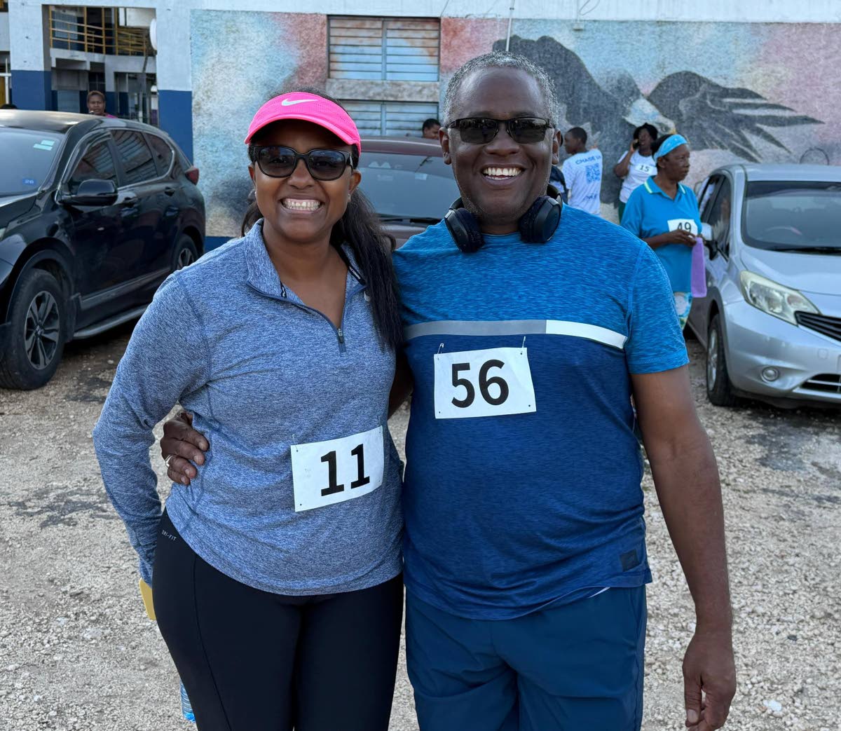 Williams-Singh and Custos Rotulorum of Manchester, Lt Col Garfield S. Green at New Forest High School’s 5K Run/Walk.