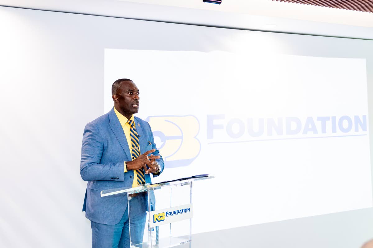 Principal Lynton Weir of Old Harbour High School addresses attendees at the MOU signing. Under his leadership, the school has earned a reputation for discipline and achievement. 