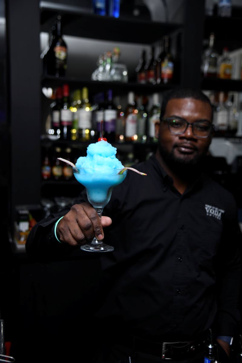 Silent blue is a frozen drink with the sweet surprise of Jolly Ranchers inside.