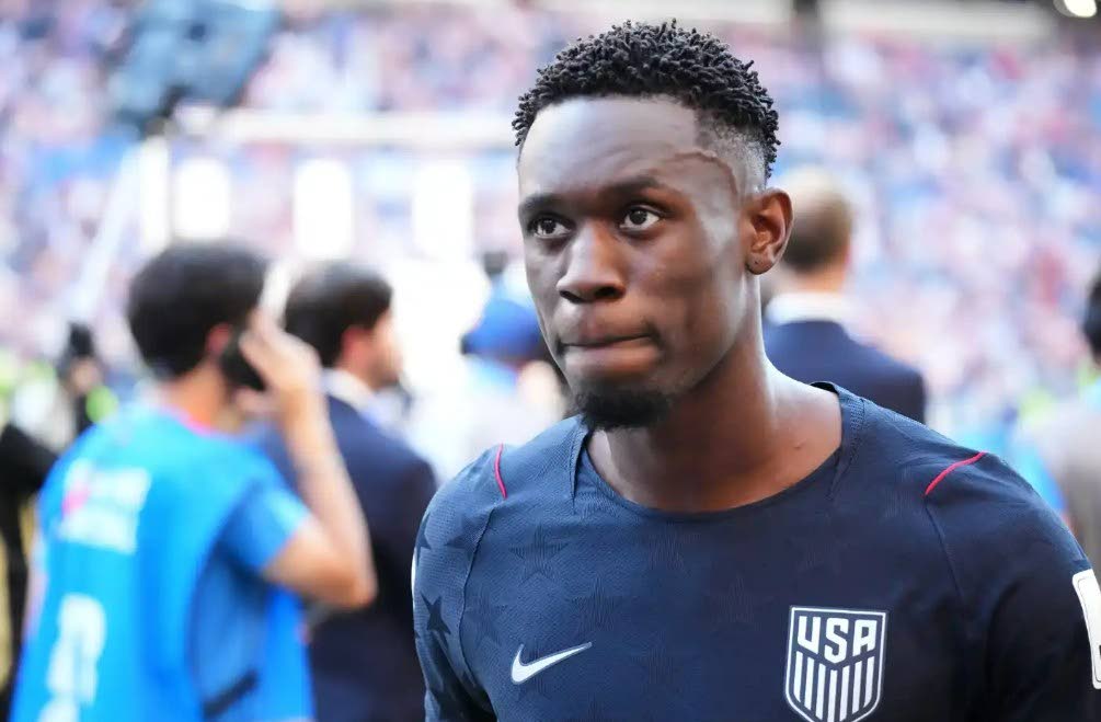 United States' Folarin Balogun (20) walks off the pitch after losing to Belgium in their World Cup round of 16 football match in Seattle, Monday, July 6, 2026. (AP Photo/Ted S. Warren)