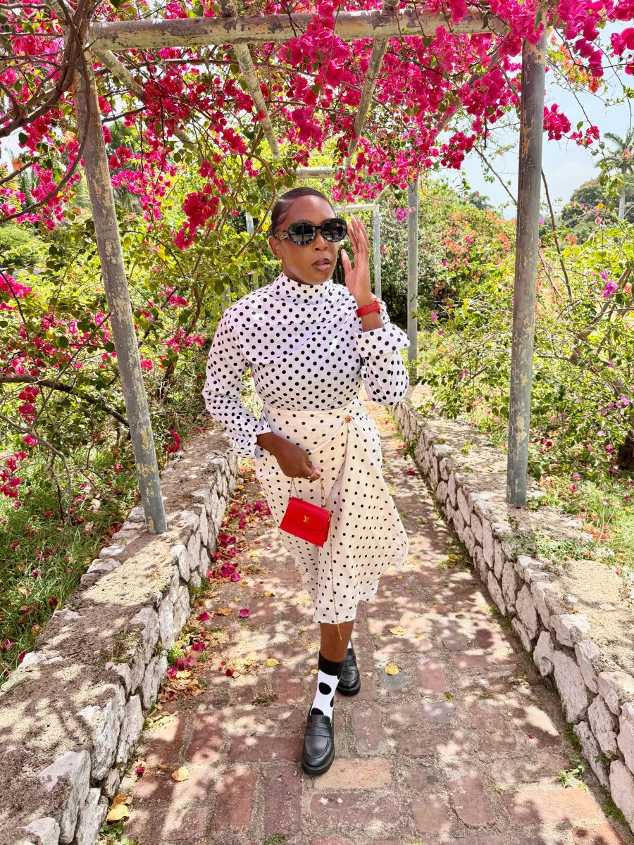 McLeggon puts her own spin on classic polka dots with a FiercebyDre top, Tajie’s Trendy Fashion skirt and loafers from Heel-O.