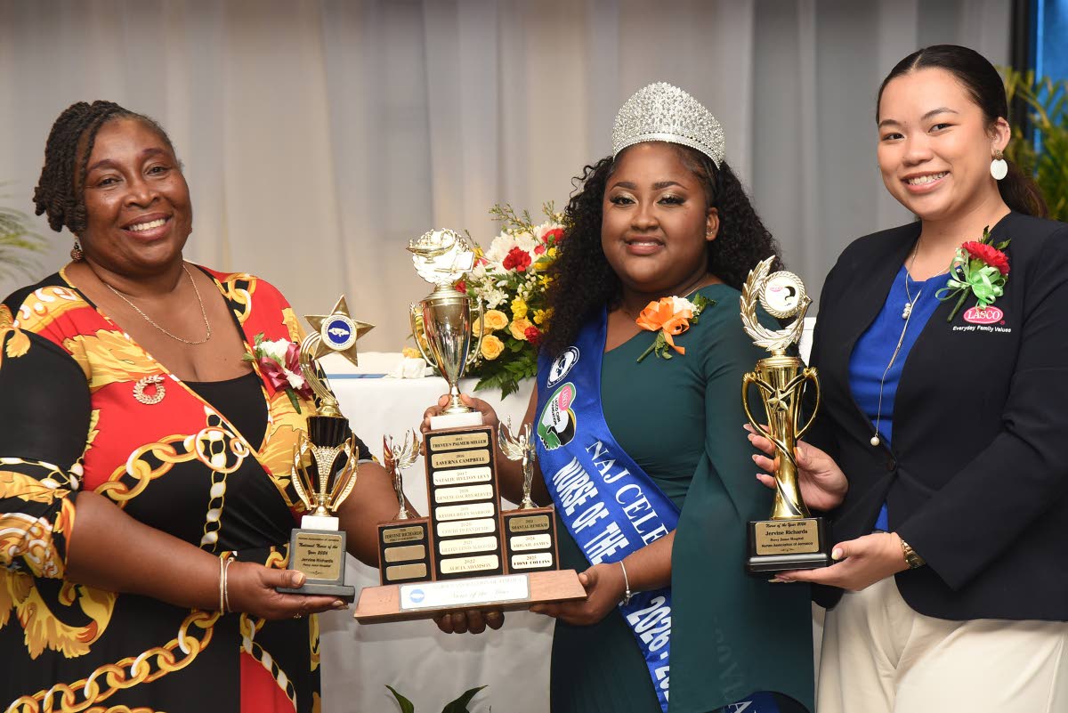 Jervine Richards (centre), nurse at the Percy Junor Hospital in Spaldings, Clarendon, is presented with her awards by Dawn-Marie Richards (left), president of the Nurses Association of Jamaica, and Ce’zanne Chin (right), corporate communications officer,