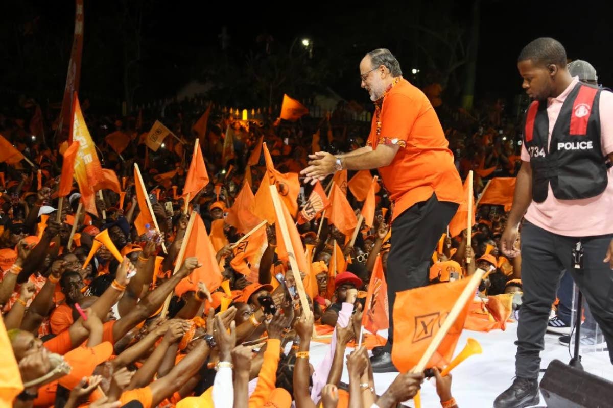 In this August 2025 photo Mark Golding is seen at a rally with PNP supporters.