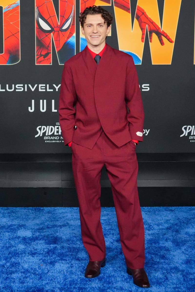 Tom Holland wears a custom Jacquemus look.