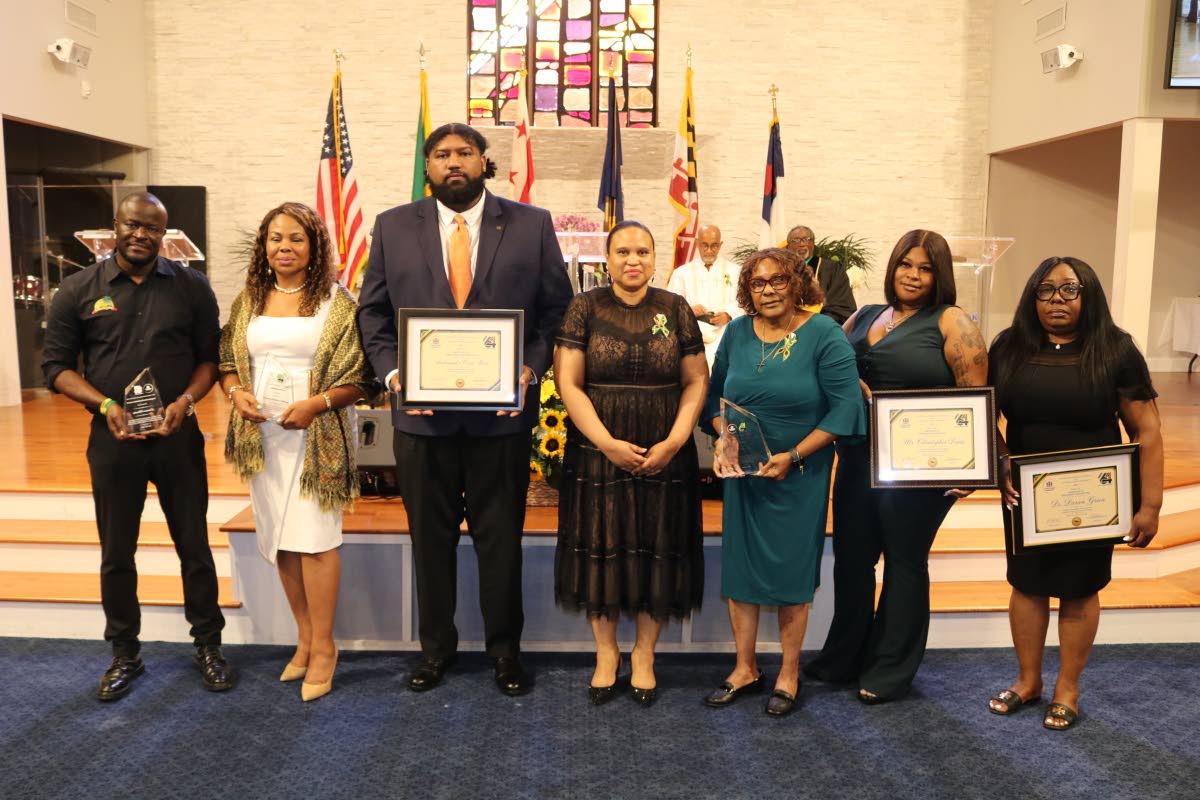 Lishann Salmon (centre), chargée d’affaires at the Embassy of Jamaica in Washington, DC,. poses with recipients of the DMV Jamaica Diaspora Awards during the thanksgiving service marking Jamaica’s 64th anniversary of Independence at the Seabrook Seven