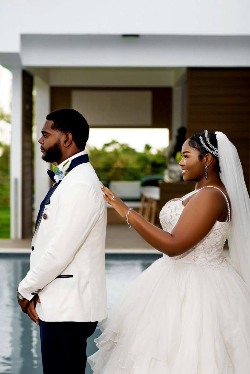 Tajay and Paige-Marie share an intimate first look ahead of the wedding ceremony.