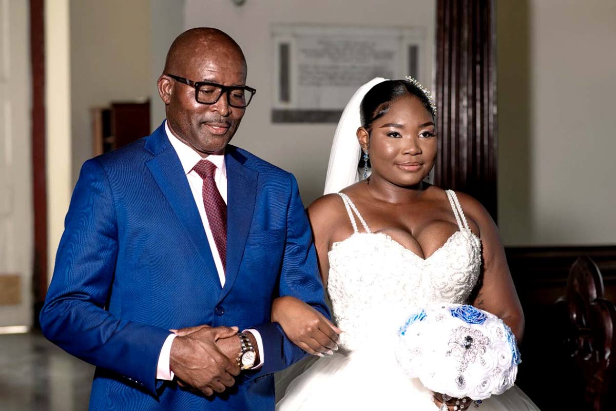 The stunning bride was escorted up the aisle by her father, Garnet Edmondson.