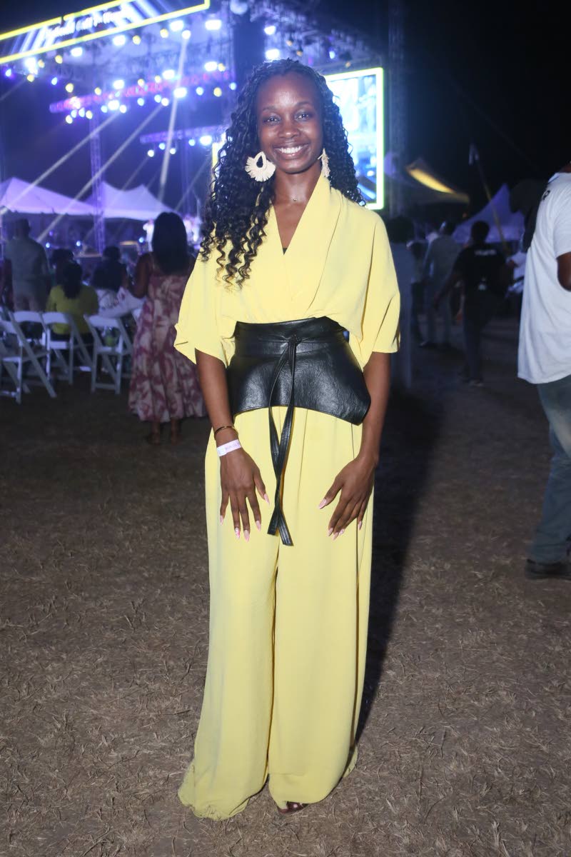 Odeka Ormsby, Come Alive Worship Challenge winner, cinches her yellow jumpsuit with a CAW Glamfair wide leather belt in classic black.
