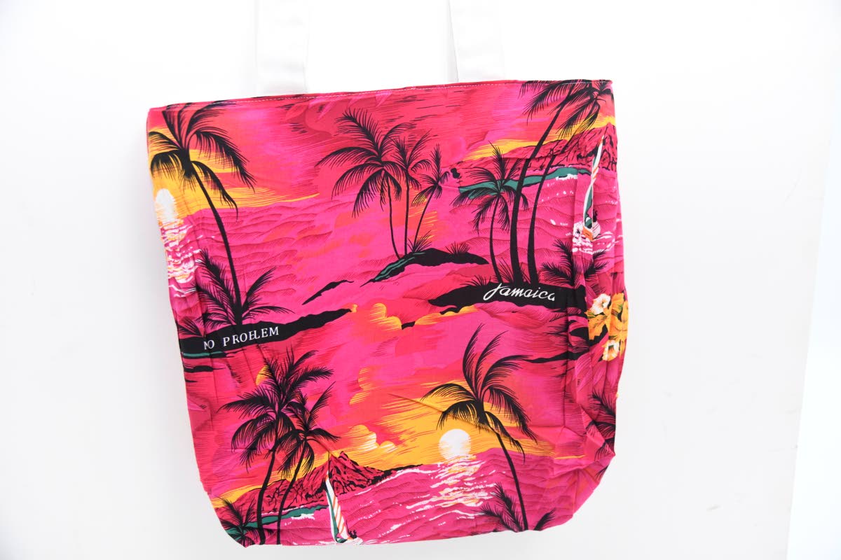 Say hello to Pink Paradise, the tote which doubles as a beach bag and is also reversible. 