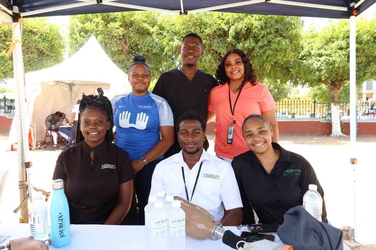 Members of the Surgix Jamaica team at their booth during the Kingston Public Hospital 250th Anniversary Health and Wellness Fair. Surgix Jamaica provides medical devices and healthcare solutions that support patient care across Jamaica. 