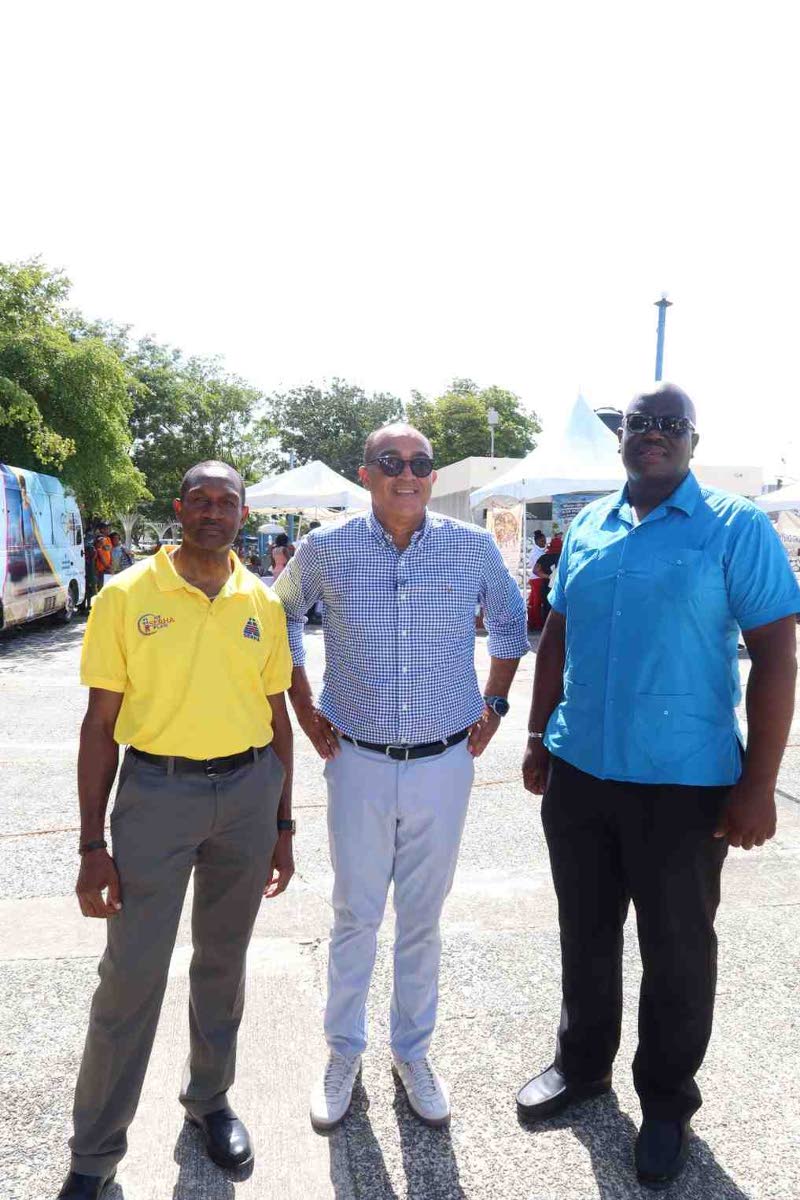 Dr Trevor Bygrave (left), senior medical officer at Kingston Public Hospital; Dr Christopher Tufton (centre), minister of health and wellness; and Dwayne Francis, chief executive officer, during the Kingston Public Hospital 250th Anniversary Health and Wel