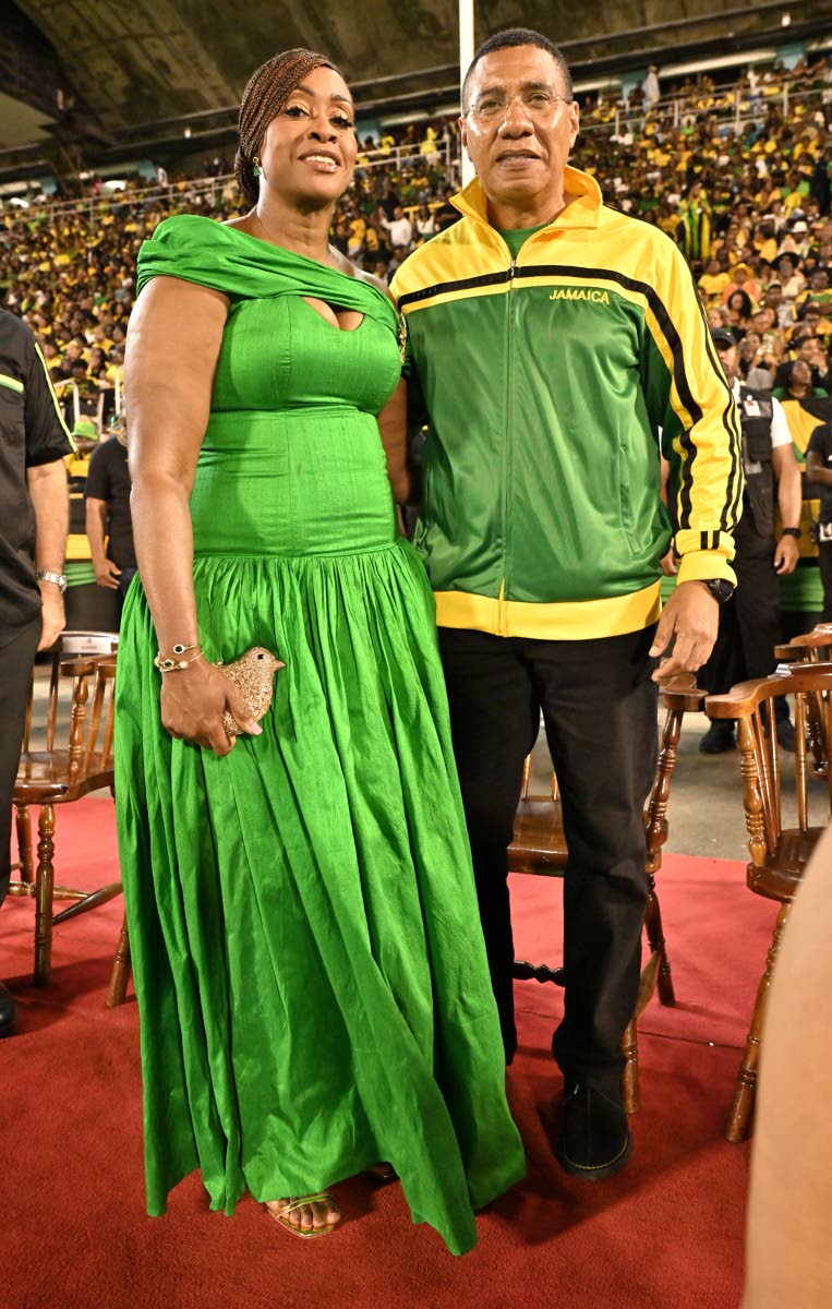 Prime Minister Dr Andrew Holness and his wife, Juliet Holness, speaker of the House of Representatives, showcase their patriotic pride, embracing the colours of the Jamaican flag in their Grand Gala looks.