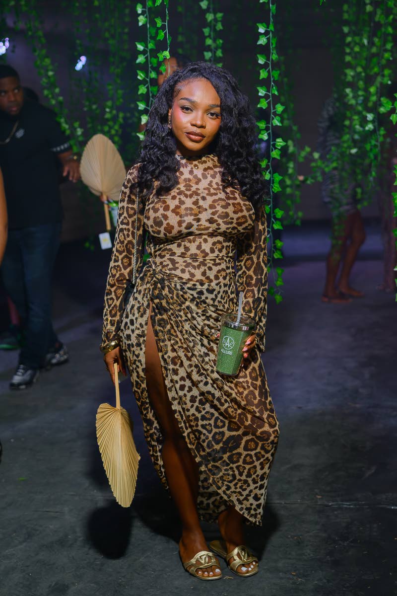 Marketing professional Michaela Vernon swipes right on a high-slit dress that perfectly complements her silhouette.
