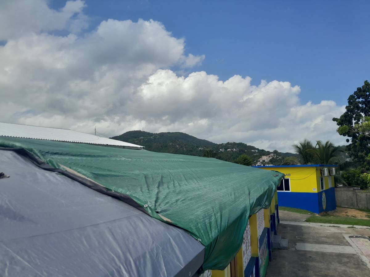 Some of the classrooms that are covered by tarpaulin.