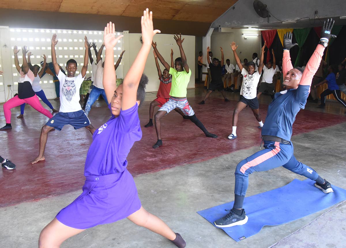 Teachers and students of Haile Selassie High School learnt stretching and yoga techniques during Selassie Moves Day as part of Haile Selassie High School Spirit Week where the students are taught how to eat right and exercise. 