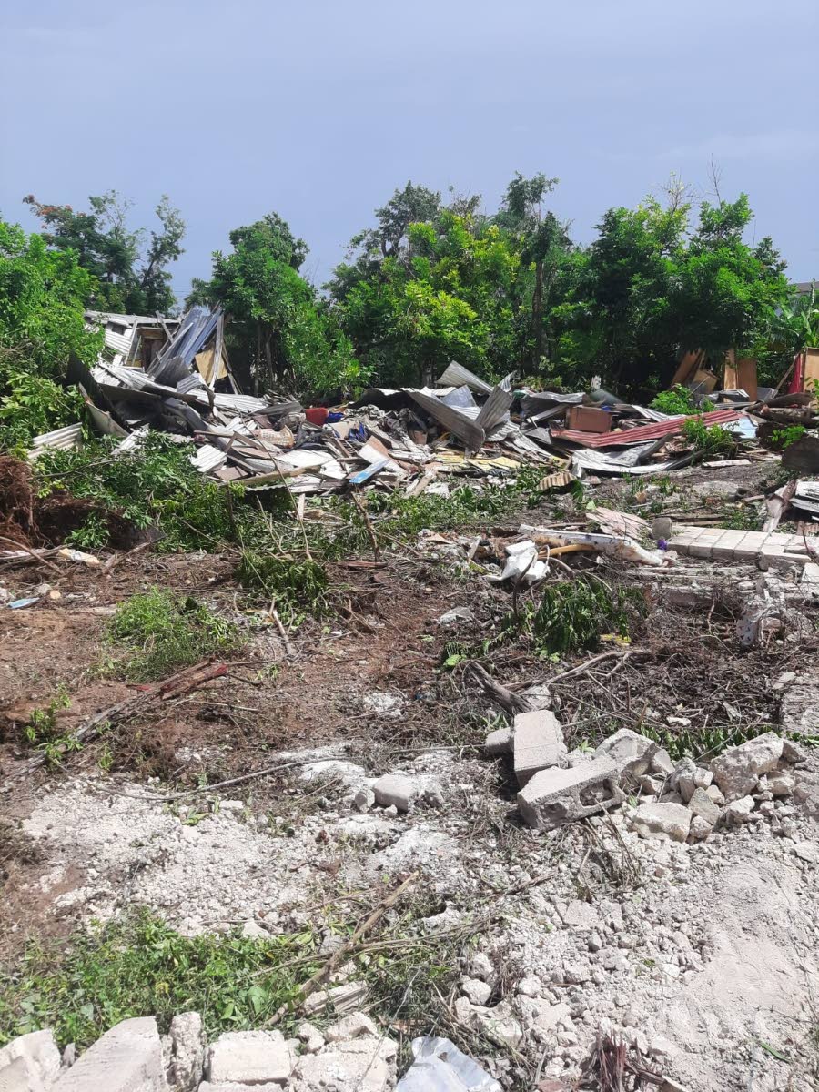 Houses in ruin after the demolition exercise in Cooper’s Pen, Trelawny, on Tuesday.