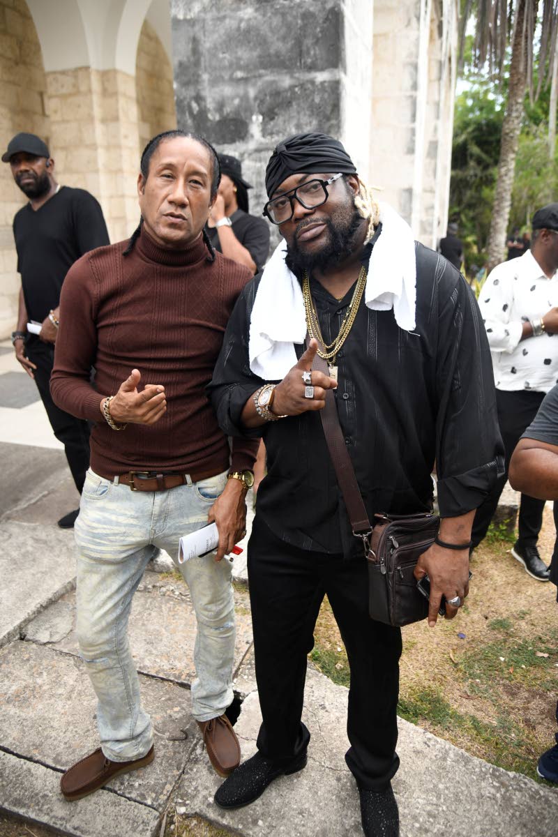 Ricky General (left) and Harry Toddler at the thanksgiving service for Fantan Mojah on Thursday.
