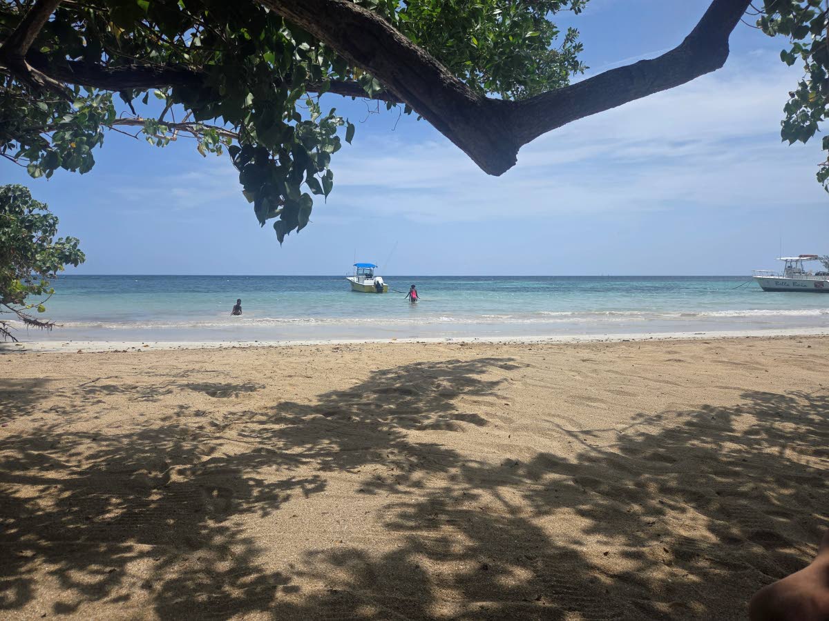 
Sun, sea, sand the cool shade. Photo taken in Ocho Rios.