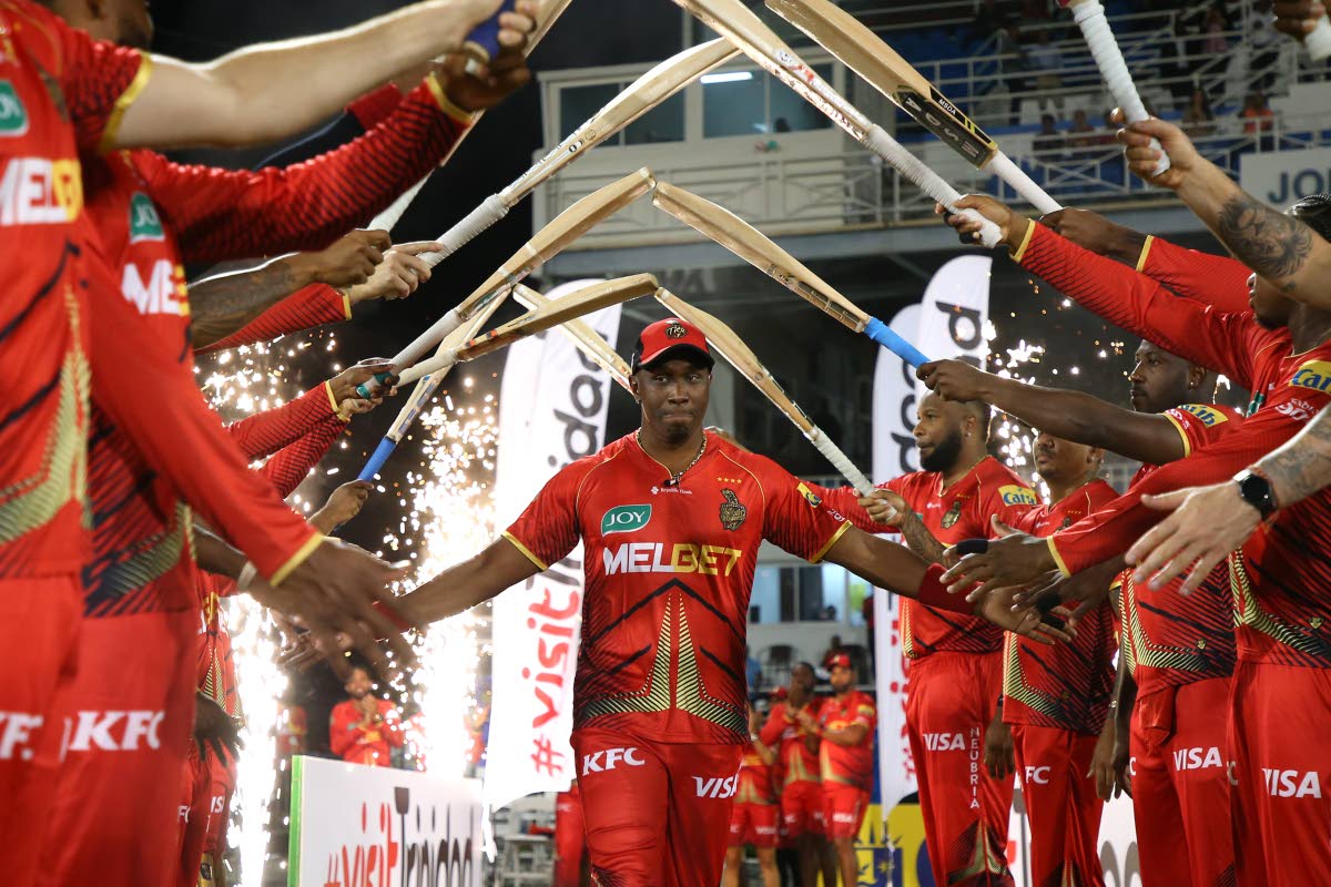 Dwayne Bravo gets a guard of honour from Trinbago Knight Riders teammates during his last season as a player in the Caribbean Premier League. 