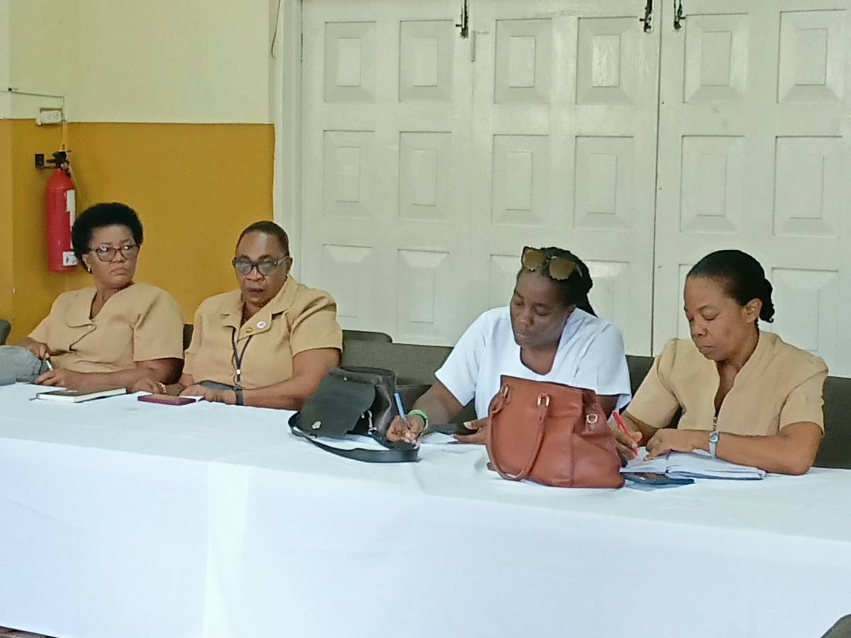 Healthcare providers take notes during the Western Regional Health Authority’s Family Health Review at the Burchell Baptist Church Hall in Montego Bay on August 20.