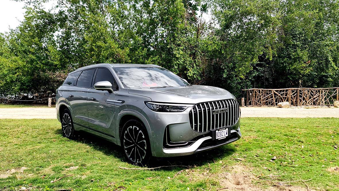 The massive vertical grille and squinting LED day-time running lights create a formidable presence that demands a second look in any rearview mirror.