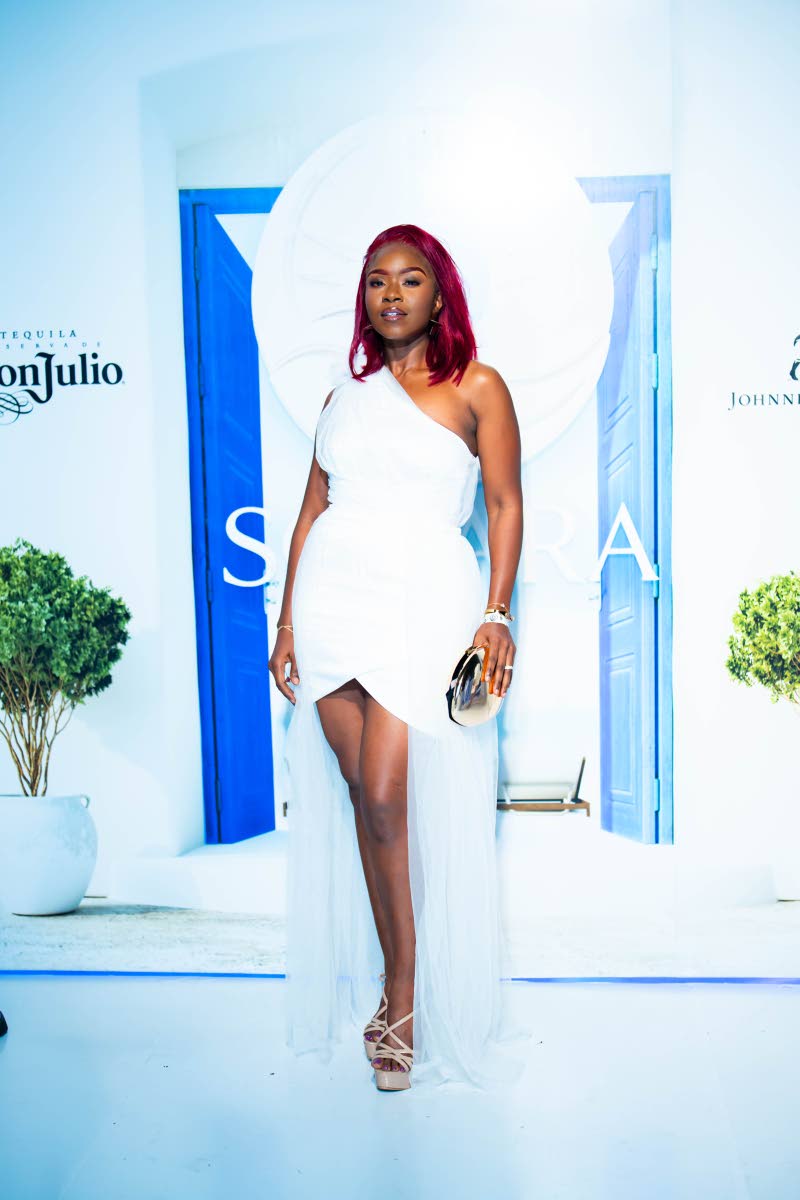 GAG Management model Moya-Maye Nanan lets her burgundy tresses do the talking, adding a bold pop of colour to the occasion.