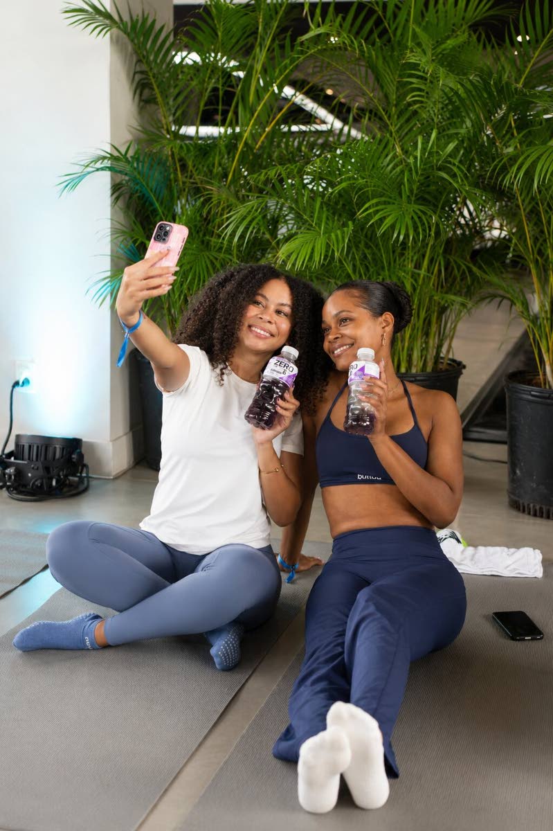 Snapping an usie are Nyoka Whyne (left), digital creator and Sky Cammock, social media officer.