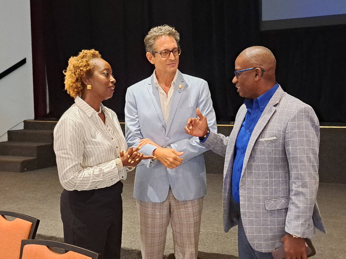From left: Nadine Spence, fourth vice-president of the Jamaica Hotel and Tourist Association (JHTA); Kyle Mais, the JHTA’s second vice-president; and William Vassell, the JHTA’s third vice-president, engage in conversation following the JHTA’s annual