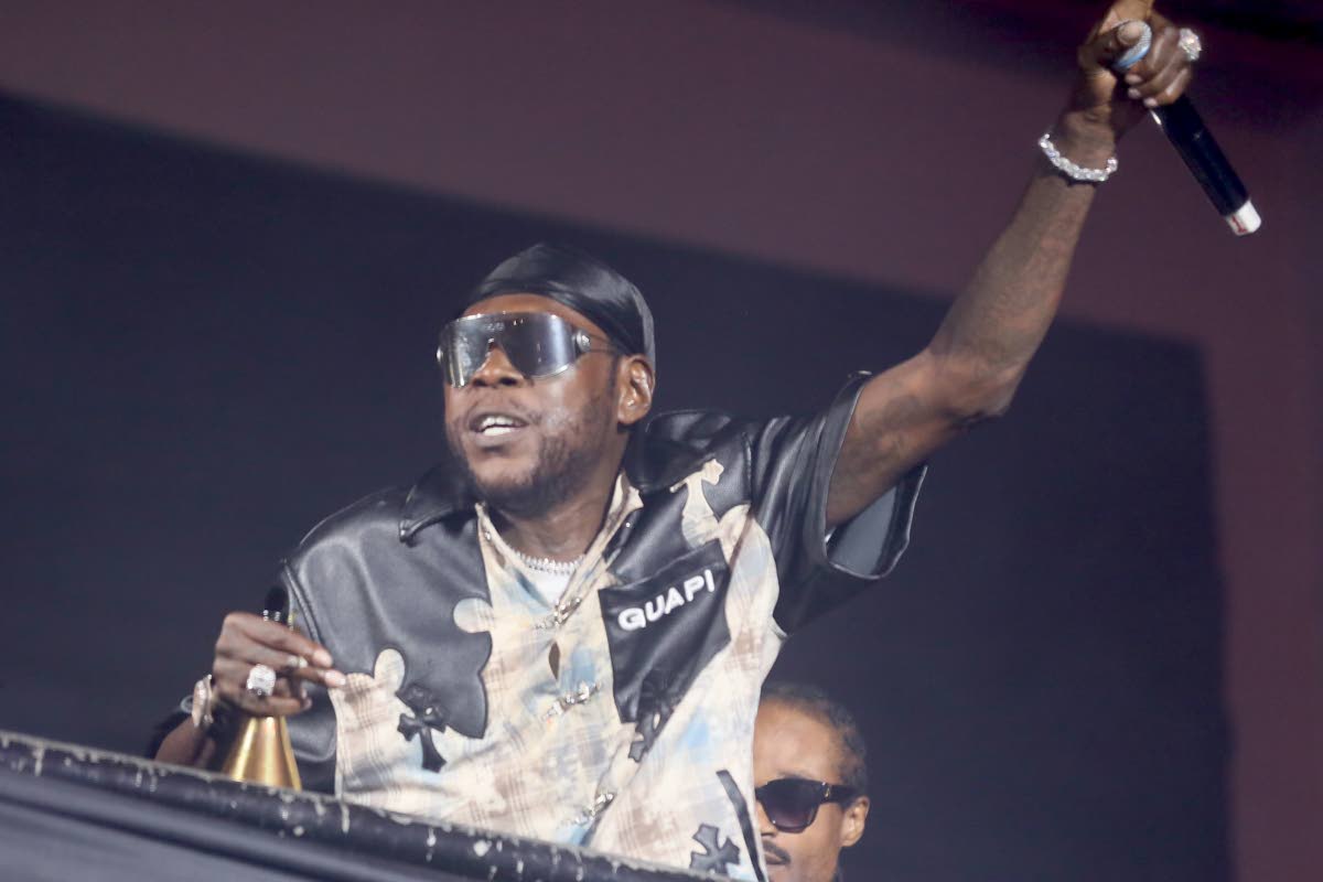 King of Dancehall Vybz Kartel engages the audience at The Return of the Building held at the National Arena on Saturday. 