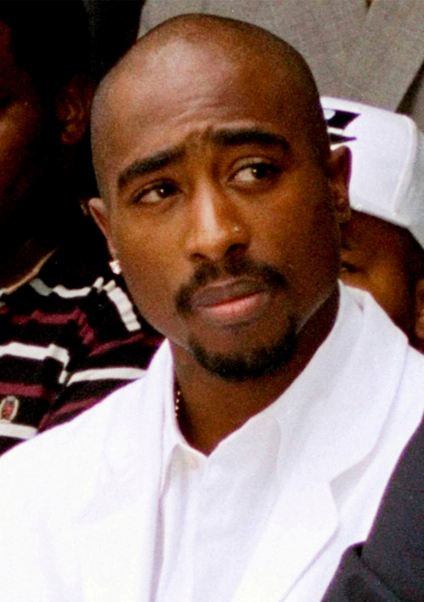 FILE - Rapper Tupac Shakur attends a voter registration event in South Central Los Angeles, Aug. 15, 1996. (AP Photo/Frank Wiese, File)