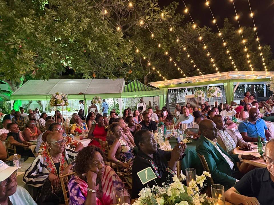 Politicians, friends and relatives celebrating with Pearnel Charles at his birthday party on Sunday.