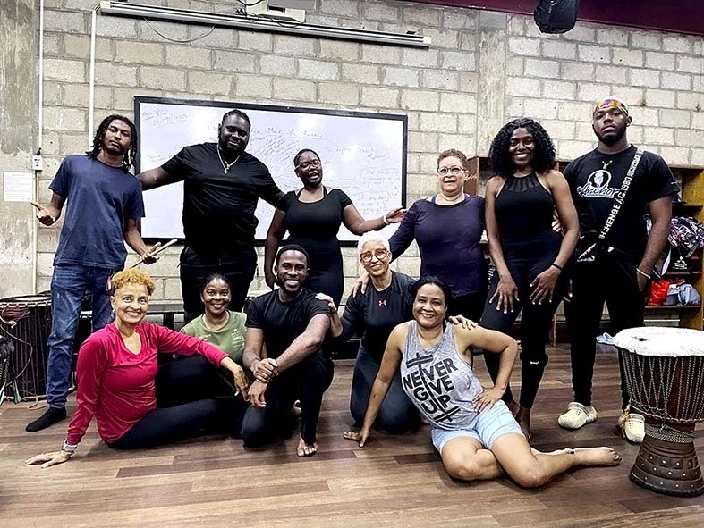 Green (centre) is happily in his element with some of his students after teaching an open dance fitness class at the Edna Manley College of the Visual and Performing Arts.