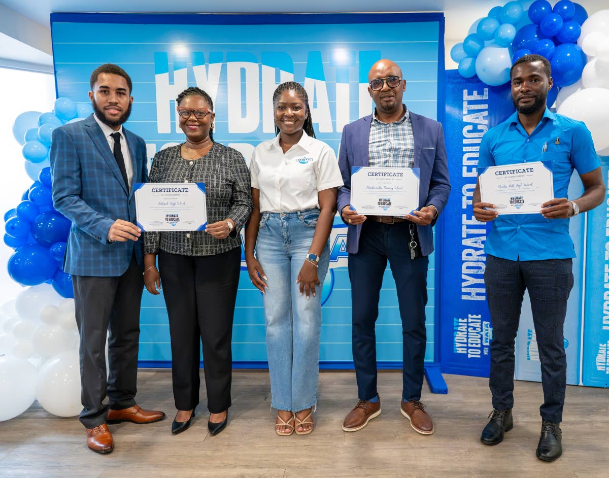 Jusanna Staple (3rd left), brand coordinator, WATA Portfolio, Wisynco Group Ltd, is pictured with school representatives during the WATA Hydrate to Educate Awards Luncheon at the S Hotel in Montego Bay on Wednesday, August 26, where western schools receive