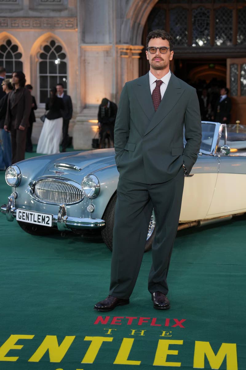 Theo James sharpens his classic tailoring with polka dots.