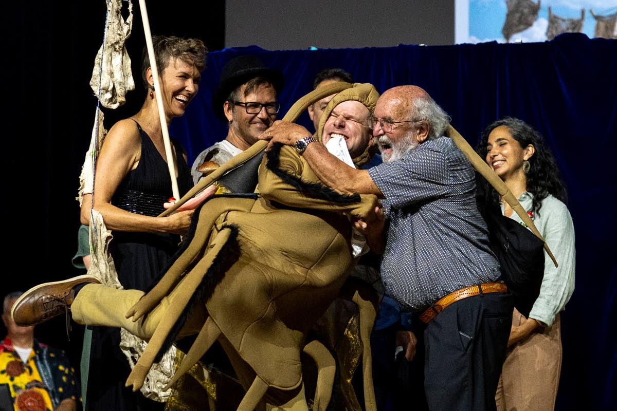 Soil Science Prize winners (from left) Pia Viviani, Franz Bender, Marcel van der Heijden and Atlant Bieri, receive their prize from Nobel Prize winner Michel Major during the Ig Nobel Prize ceremony held in the Zurich Convention Center in Zurich, Switzerla