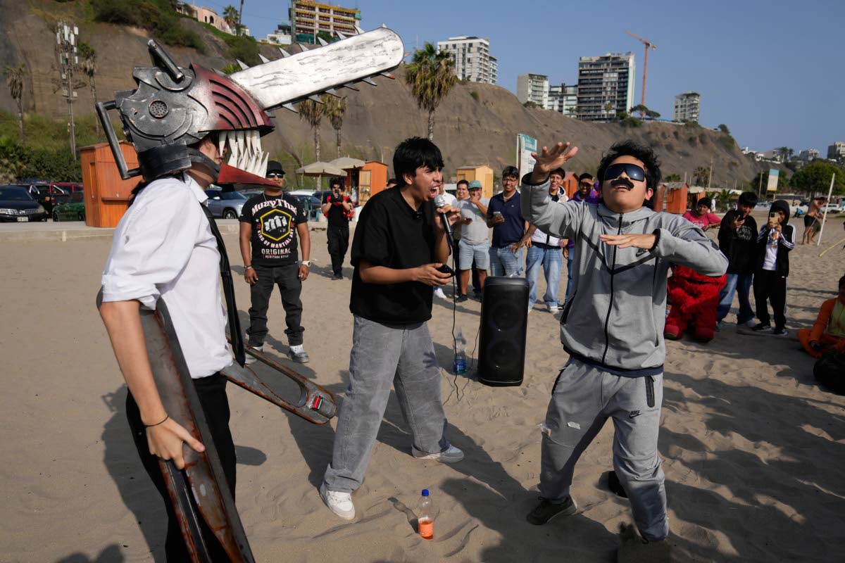 Young men dressed as ‘Mr Chainsaw’ and ‘Maduro’ face off in an aura-farming battle at Las Sombrillas beach in Lima, Peru, on August 29.