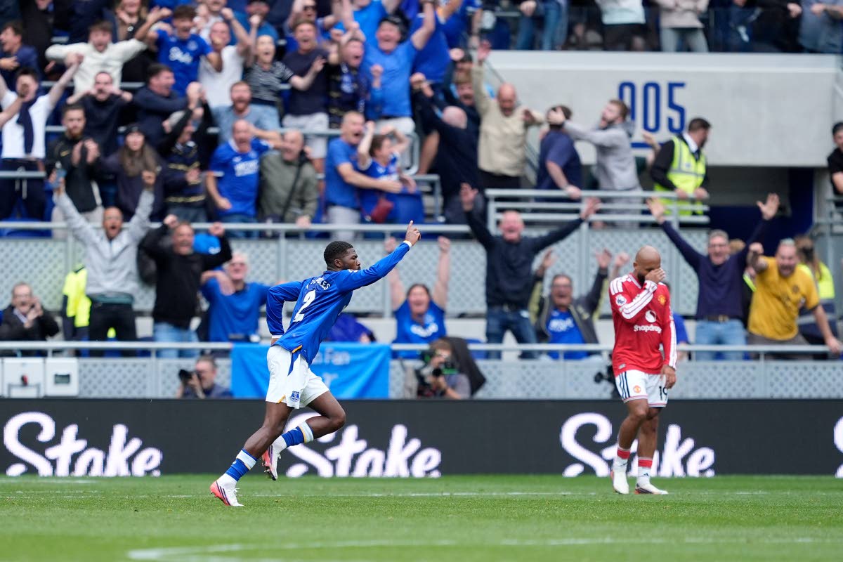 Everton's Ainsley Maitland-Niles celebrates scoring their side's second goal of the game during the English Premier League football match between Everton and Manchester United in Liverpool, England, Sunday, September 6, 2026. (Peter Byrne/PA via AP)