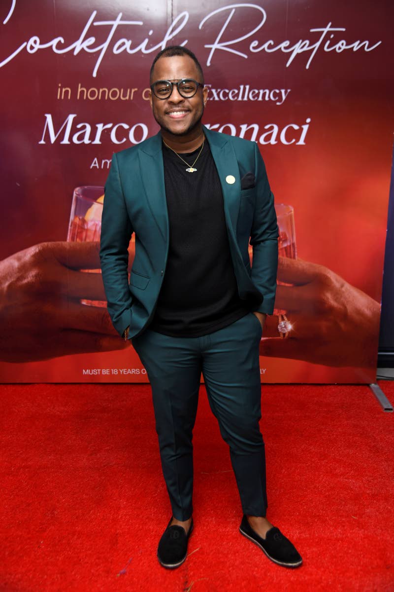Fashion-forward in an emerald green suit is Garfene Grandison, corporate communications manager at J. Wray and Nephew.