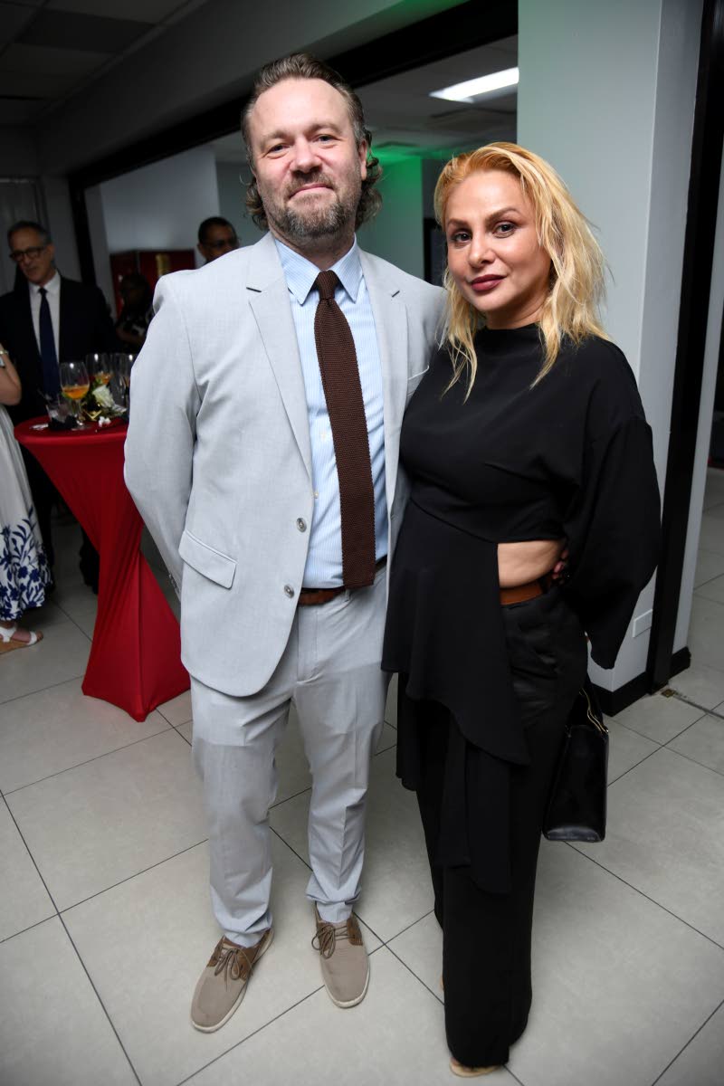 Antoine Simenel (left), deputy head of mission at the Embassy of France in Jamaica, and his lovely wife, Daiana. 