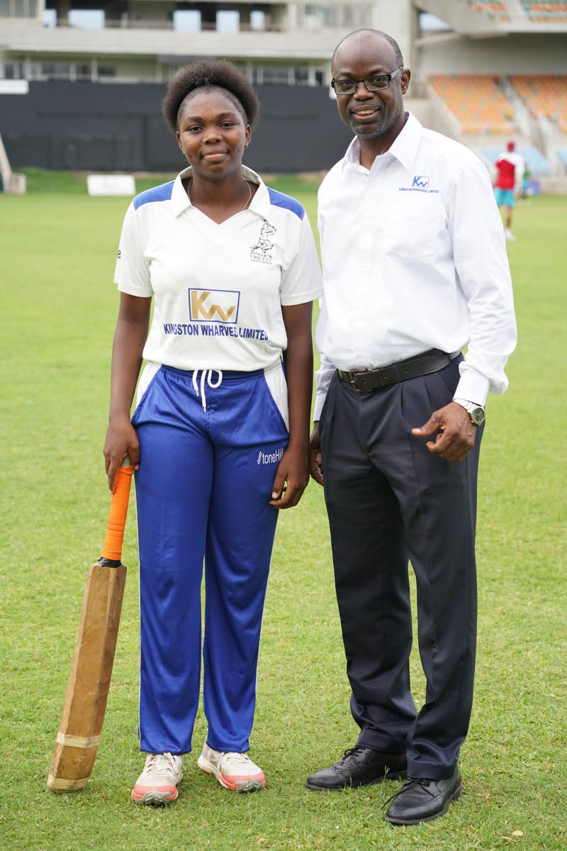 Abigail Bryce, West Indies Under-19 West Indies Women player at the 2022 Kingston Wharves U-15 finals with KWL Business Development Manager Alfred McDonald. She became the first female to make a century during the tournament.   