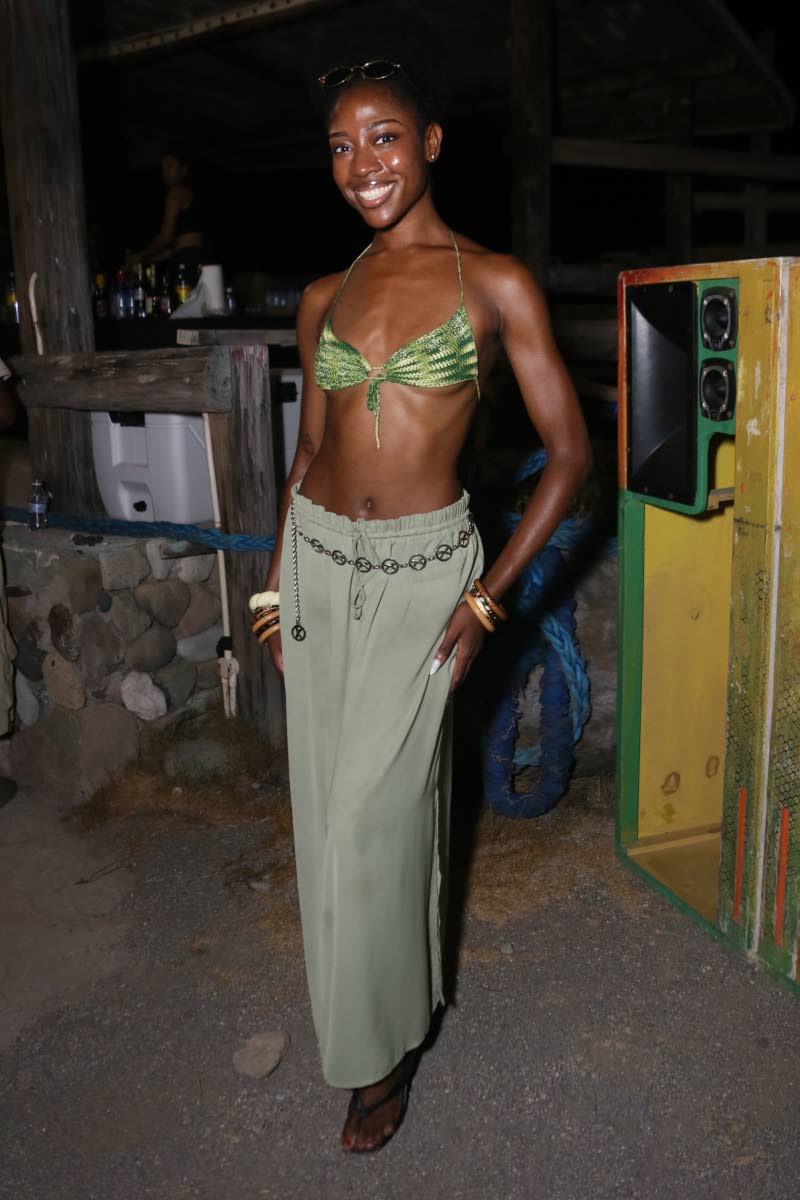 Kwela Cole, media personality and Miss Universe Jamaica 2026 contestant, is a vision in green, showing off her toned core.