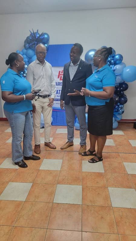 Employees and team members gather during H&L Agro’s Prostate Cancer Awareness Month launch. From right: Ruel Chen, Edward Taylor, Andre Davidson, Gasnel Blair, Robert Hill, Sebert Thompson, Cleveland Dawkins, Reon Tulloch, Jemilia McDonald, Aaliyah Hall,