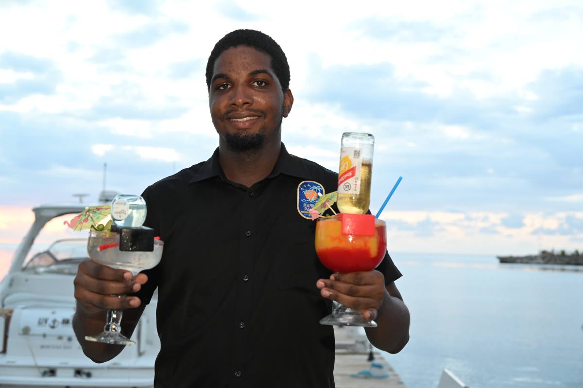 Romaine Fung-Chung, bar manager of Marina Palms, serves up some of the creative drinks found only at the restaurant.