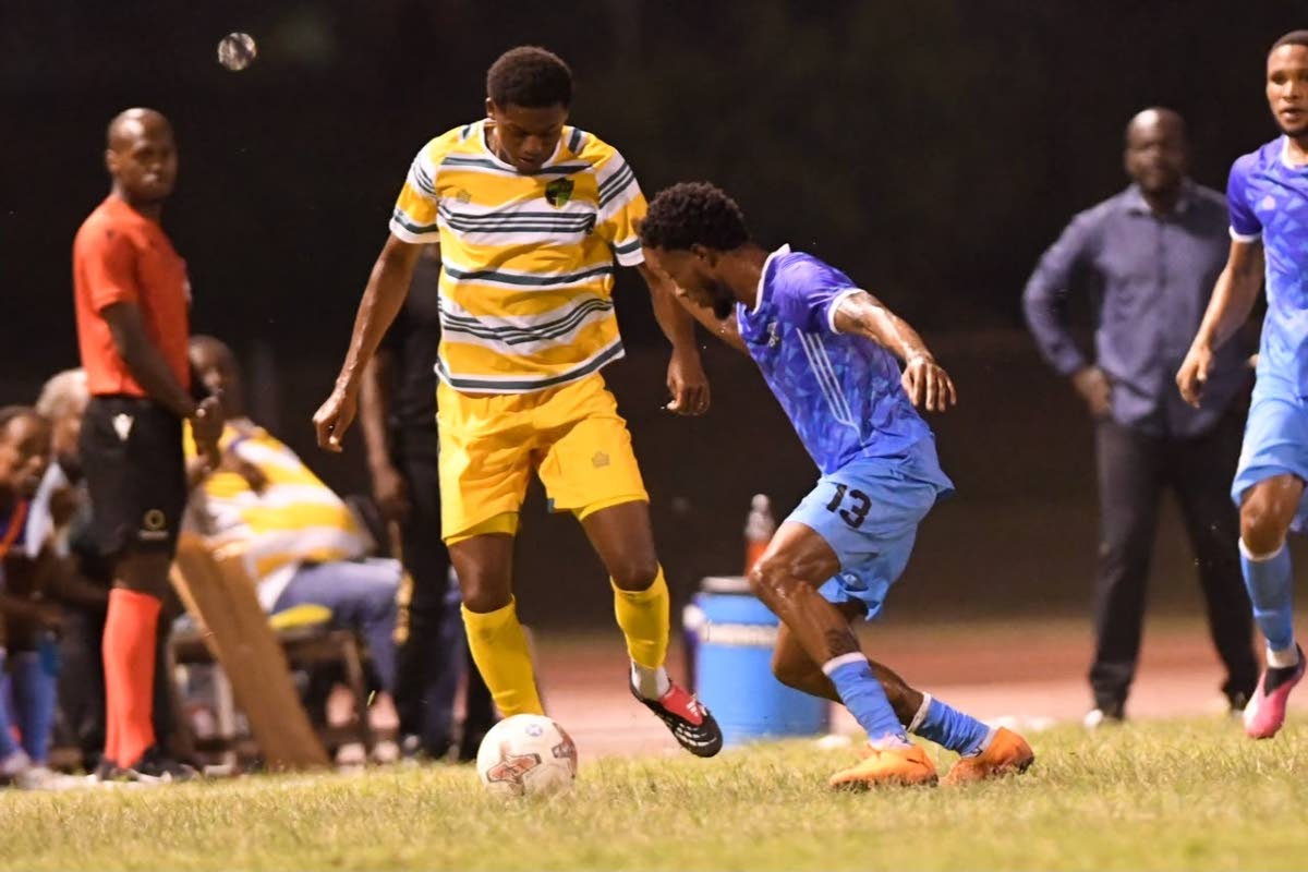 Action between Molynes United and Treasure Beach in a Jamaica Premier League football game played at the National Stadium early last month. Molynes came from behind to win 3-2.