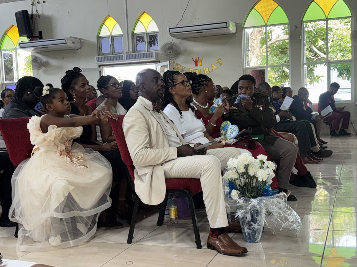 Tributes pour in for the late Jerry Reid as family members look on.
